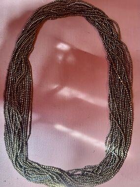 20 strands bronze/copper seed beads; necklace